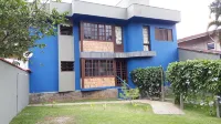 CHALE TERREO 230 METERS FROM THE BEACH OF THE ENSEADA and 3 MINUTES FROM THE SAND. Hotels in Praia da Enseada