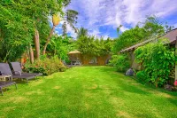 Tropical Garden Family Home - Sleeps 6 - Walk to Beach, BBQ, Hot Tub
