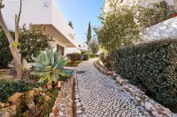 APARTMENT TANSY DIRECTLY BY THE SEA WITH A DREAM SEA VIEW AND POOL Hotels near Albandeira Beach