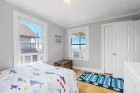 Enjoy Gorgeous Sunsets from Your Waterfront Beach Cottage Hotels near Bumpkin Island