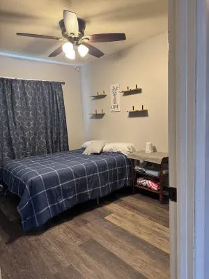 Charming 3-bedroom pet friendly house with fenced in yard in Clinton, IA.