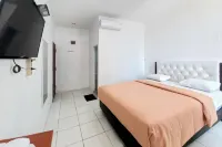 JOY GuestHouse Pekanbaru Mitra RedDoorz Các khách sạn ở Simpang Baru