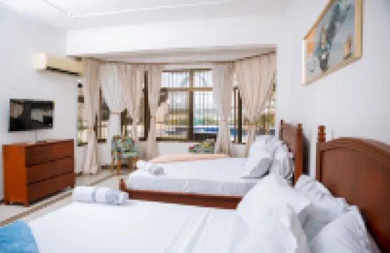 Spacious Apartment in Dar es Salaam with City, Ocean, and Pool Views