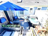Modern East End Loft - Private Beach, In-Ground Pool Access, & Hot Tub!