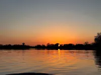 Enjoy beautiful sunsets year round from this spacious 3 BR home on Lake Orono.