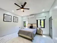 Spacious 4-bedroom house with private pool AC in welcoming in Roatan Honduras