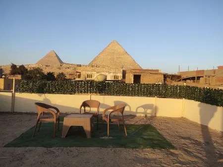 Golden Suite Отели рядом с достопримечательностью «Каирский университет»