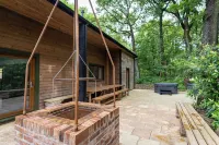 Errwood; woodland lodge for 14 with 2 hot tubs in the Staffordshire Moorlands