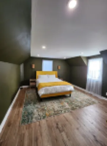 This is a private second-floor suite with its own entrance.