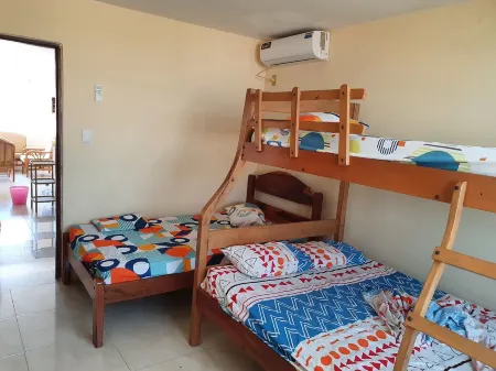 Holiday house with swimming pool facing the sea