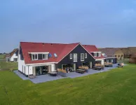 Modern Villa in De Cocksdorp Near the Beach Hotels near Landal Sluftervallei