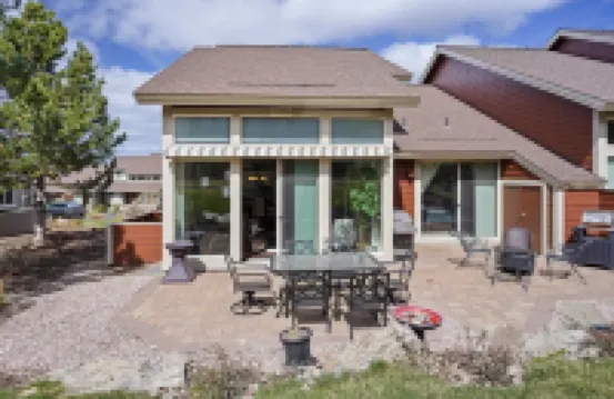 Village 62 with Firepit on Backyard