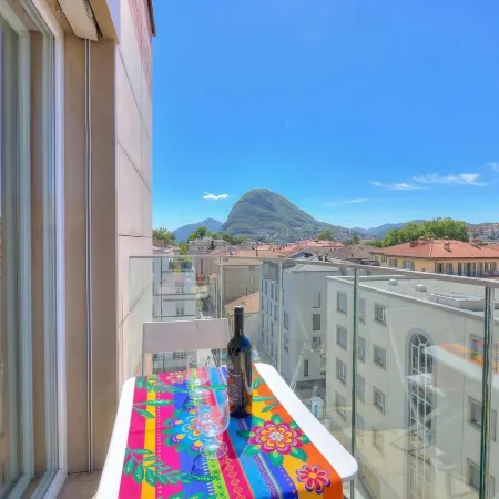 Attico Al Parco: Penthouse in Lugano | Balcony, A/C & 2 Min from Lake - Happy Rentals
