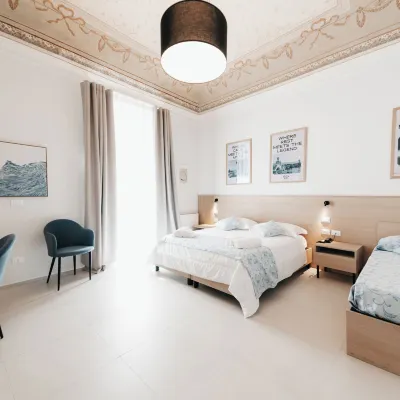 Sirenuse Suites精品公寓酒店RTA 鄰近Ipogeo Genoviva的酒店