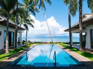 Beachfront Bali Style Villa in ResortM5)