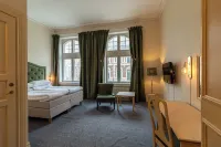 Home Hotel Christian IV Hotels near Alrahma Mosque