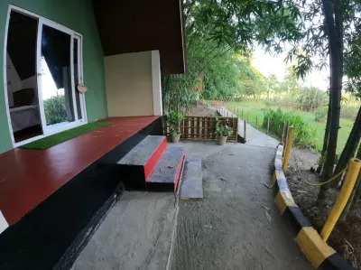 Pobitora Villge Eco Camp By GRB Hotels near Natural View with a couch of Rock