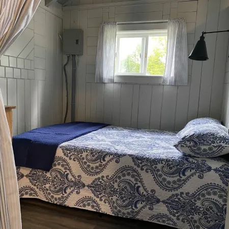 Waterfront cabin with access to Long Lake and Mud Lake.