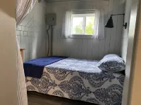 Waterfront cabin with access to Long Lake and Mud Lake.