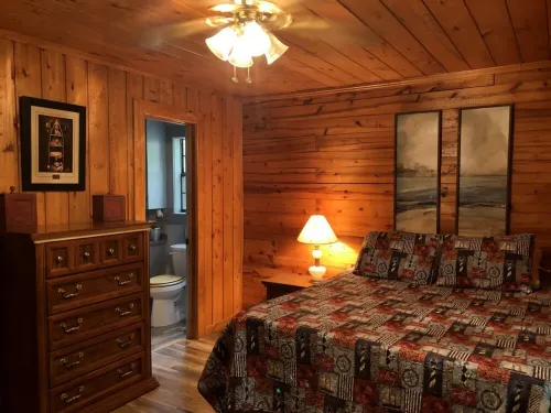Lakefront rustic log cabin. Any season vacation, get away, or retreat.