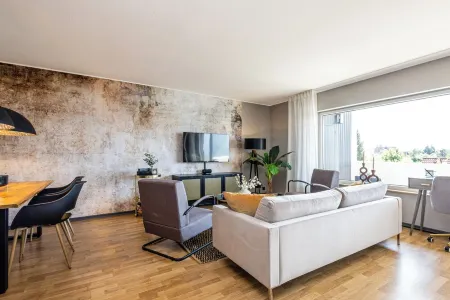 Stylish and cozy two-room apartment with balcony in the Bergisches Land Отели в г. Оденталь