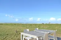 Fishing house in front of the sea.