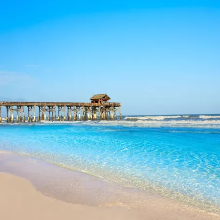 Wake to Waves, Watch Rockets Soar: Your Dreamy Oceanfront Condo Awaits