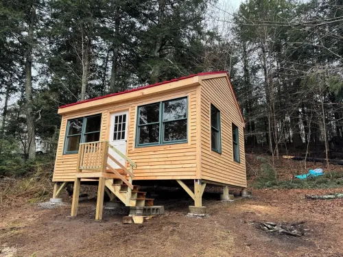 Maine Cabin Masters Camp completely redone waiting for a Lake loving family !