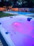 Private 4 bedroom house near the beach with pool, hot tub, fire pit, game room.