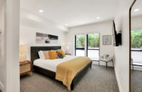 Pets Stay Free • Private Terrace • Elevator • King Beds • In-Unit W/D