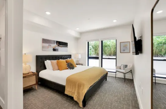 Pets Stay Free • Private Terrace • Elevator • King Beds • In-Unit W/D