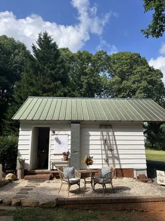1930’s Guest Cottage and Vintage Shop with 1/2 Bath and Full Bed