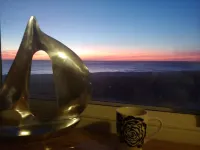 See sunrise over the ocean from your living room!