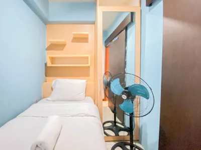 Homey Living 2BR at Jarrdin Cihampelas Apartment By Travelio