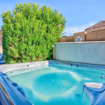 Tranquil Oasis! 3 Bdrm Home with No Fee Heated Pool- Hot Tub!  Great Location!!