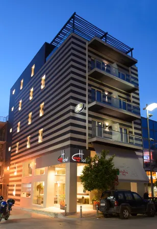 Castello City Отели рядом с достопримечательностью «Hellenic Open University Laboratories»