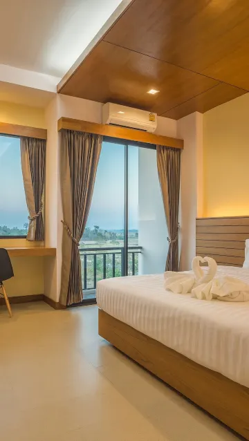 ห้องดีลักซ์ เตียงใหญ่ 1 เตียง