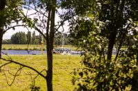 A treasure chest behind the dike at the harbor for two people
