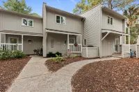 Charming Townhouse with Golf Course Views - Cozy Escape with Sunroom
