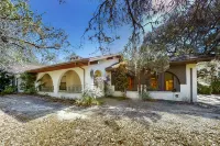 Inviting home with pool, patio, grill, full kitchen, central AC, & W/D