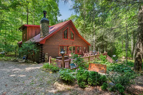 Secluded Cabin by Big Creek with Hot Tub - Cozy Rustic Retreat