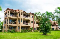 Warm Interiors and Orange Hues on Ground Floor in Front of Beach Hotels near Playa Flamingo