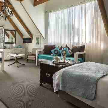 TNiqua Stable Inn Rooms