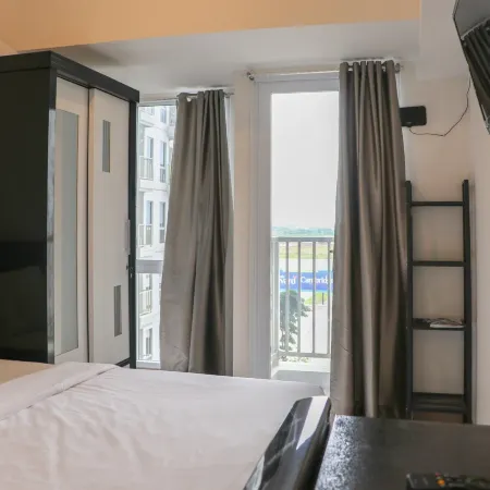 Comfy and Simply Studio Tokyo Riverside Pik 2 Apartment