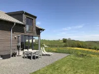Modern House-new building with a distant view in the National Park, the "Eifelsteig"