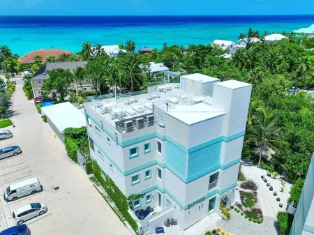 Private 7 Mile Beach Beach Club. Ocean views from Roof Terrace and Pool Pavilion