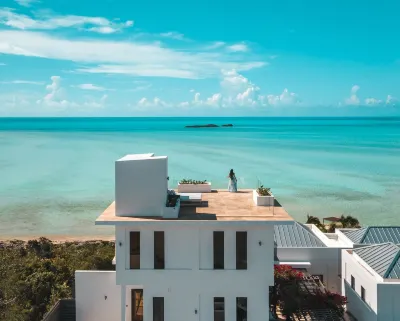 Modern Beachfront 2bd-2.5th with rooftop terrace and private pool!
