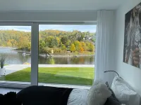 Apartments -Saaldorf WG 2, terrace and view of the reservoir Hotels in Saale-Orla-Kreis