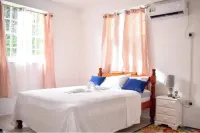 Large 2 Bedroom 2 Bathroom Apartment #4 in Roseau. Bus stops right in front! Hotels in Loubiere