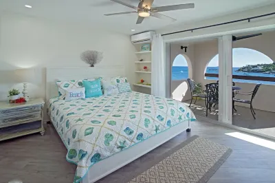 Villa Del Mar - Ocean Front Renovated Condo at Cowpet Bay
